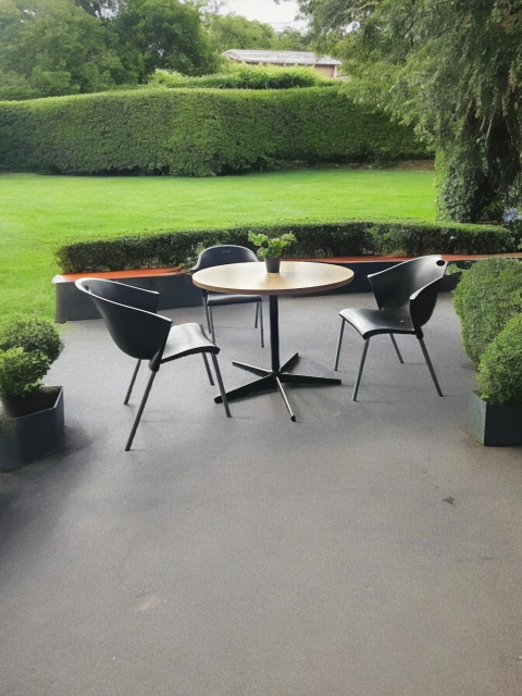 Sitting table and chairs in backyard